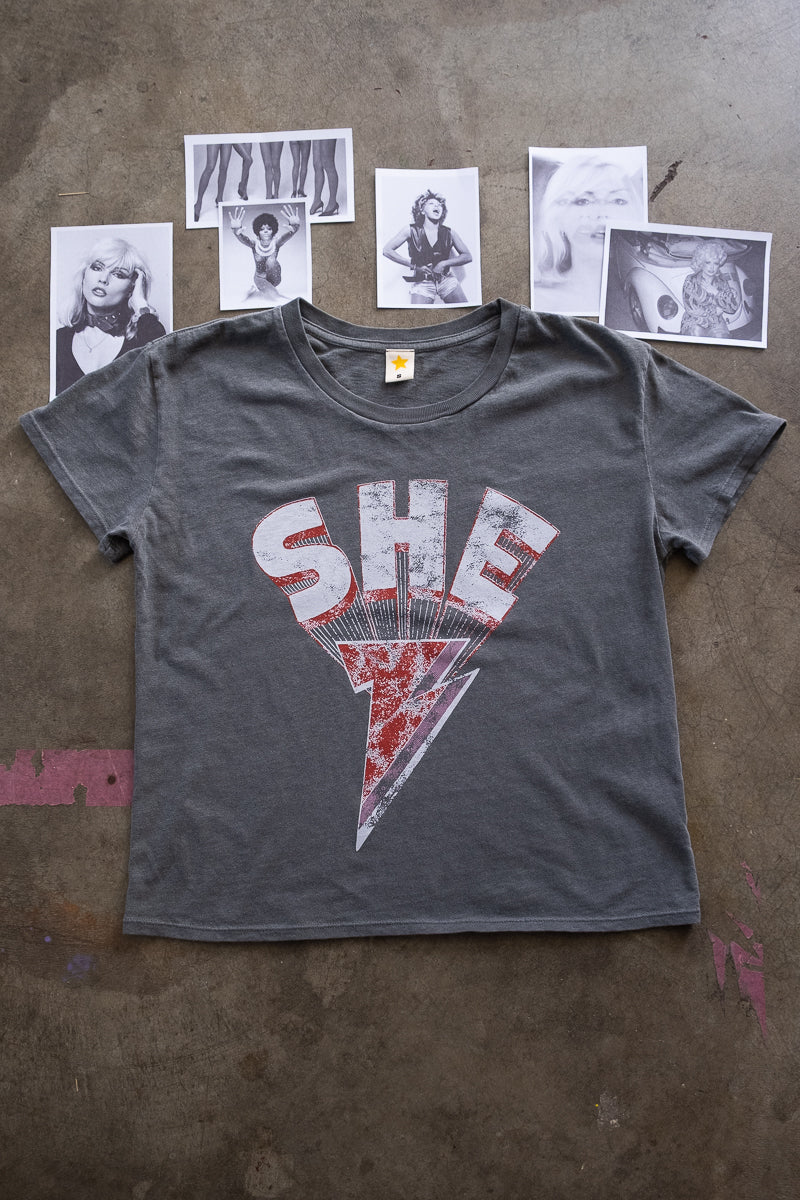 the "she energy" graphic tee on vintage black