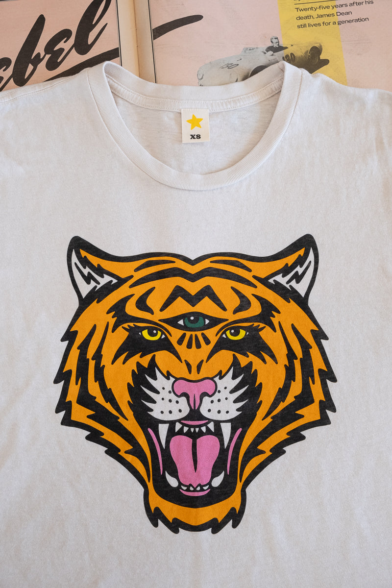 the "cosmic tiger" graphic tee on white