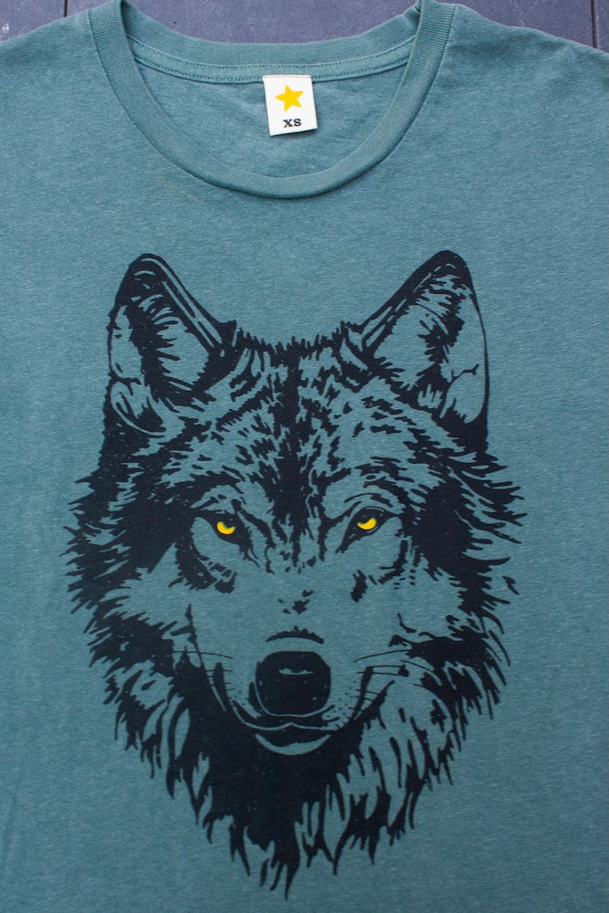 the "mother wolf" graphic tee on vintage green