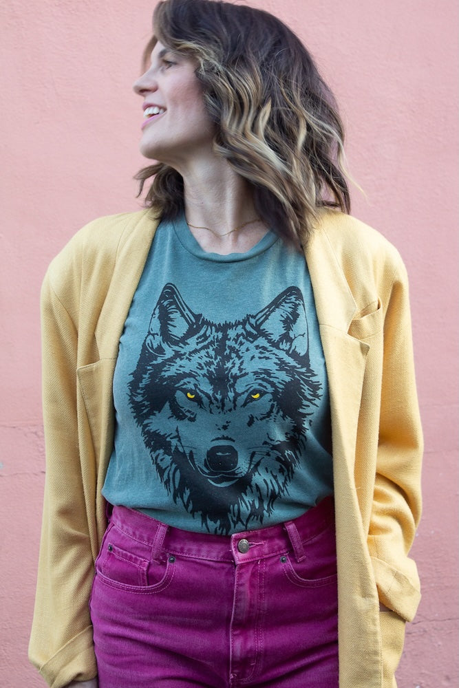 the "mother wolf" graphic tee on vintage green