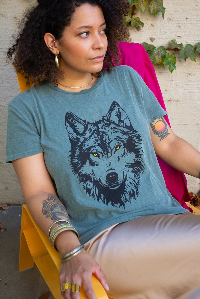 the "mother wolf" graphic tee on vintage green