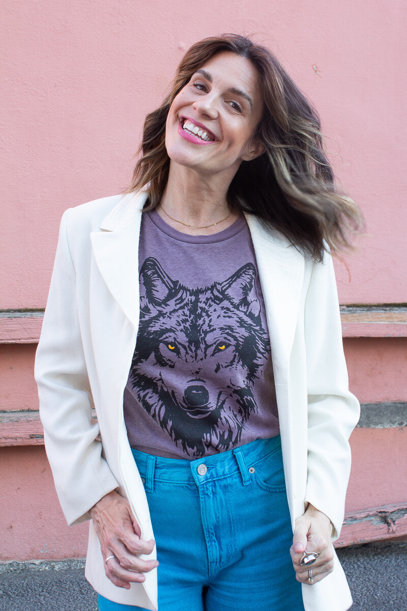 the "mother wolf" graphic tee on purple