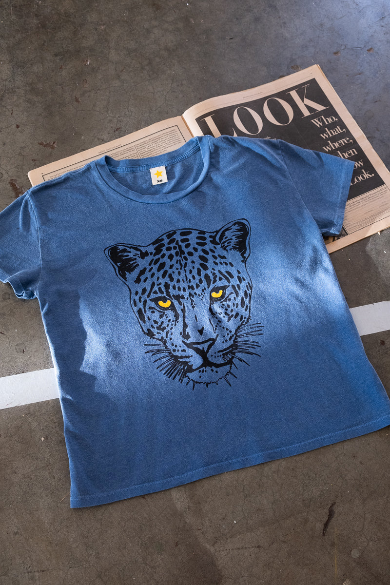 the "snow leopard" graphic tee on blue
