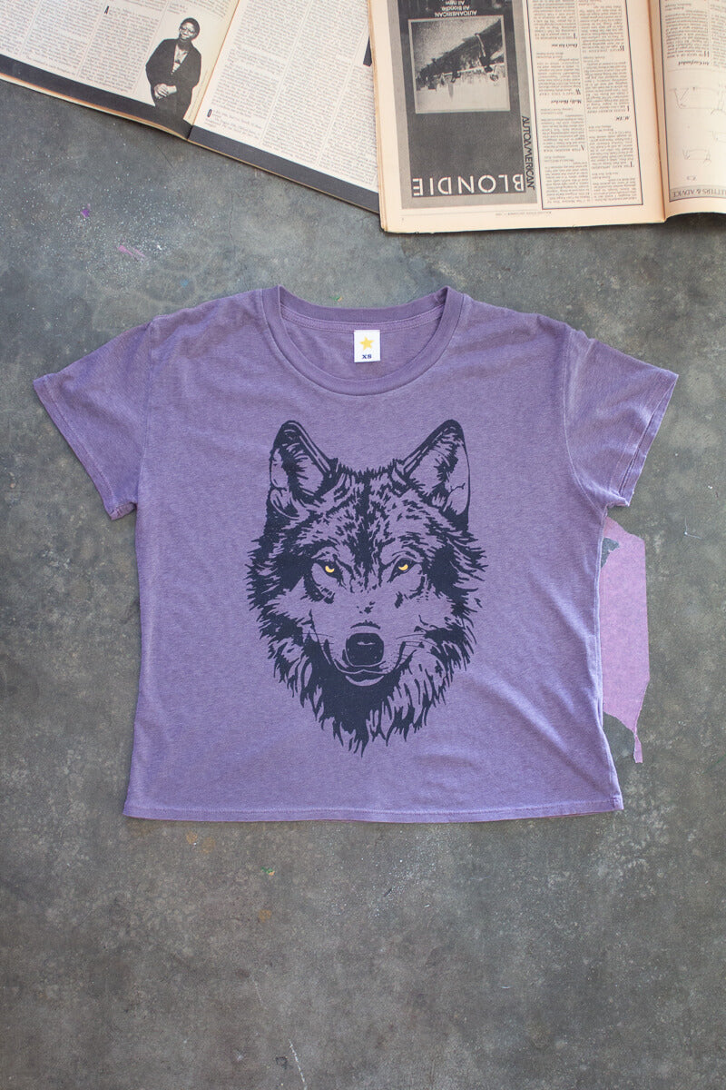 the "mother wolf" graphic tee on purple