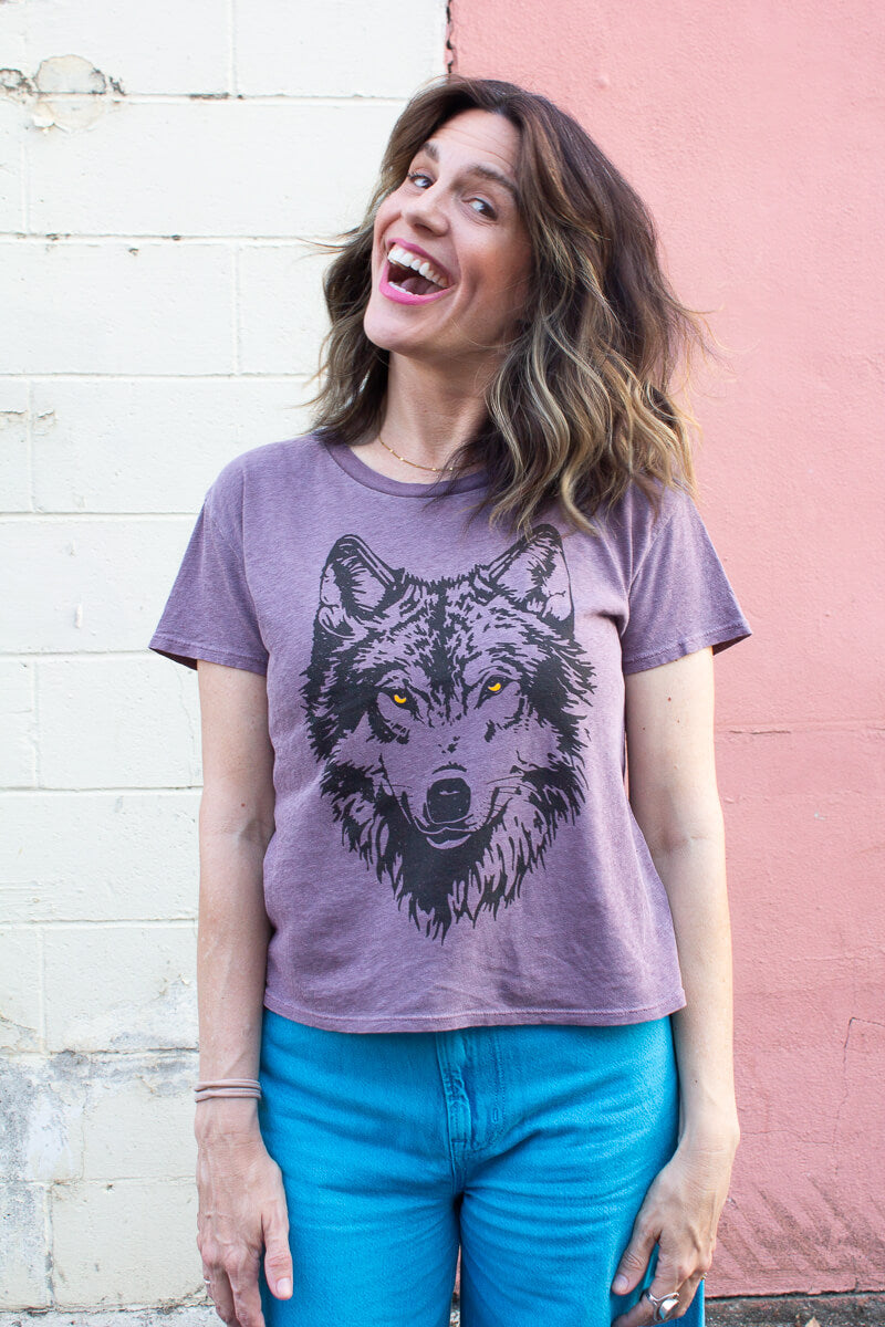 the "mother wolf" graphic tee on purple