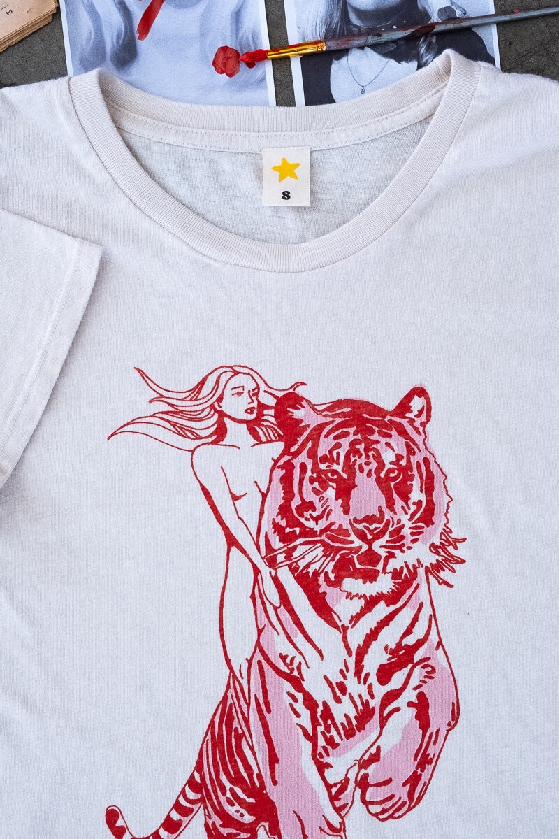 the "untamed" graphic tee on white