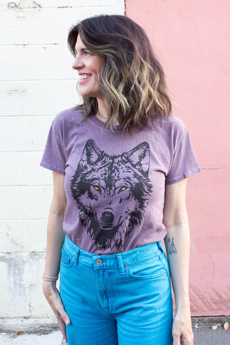 the "mother wolf" graphic tee on purple