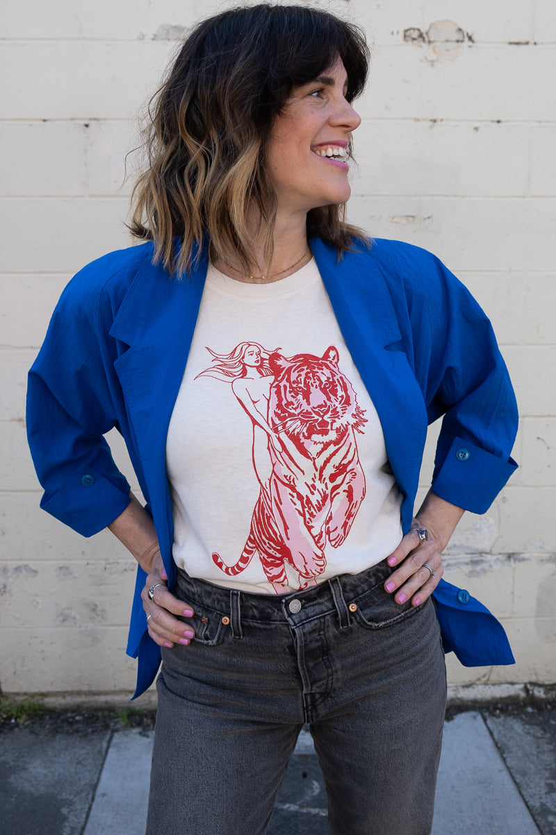 the "untamed" graphic tee on white