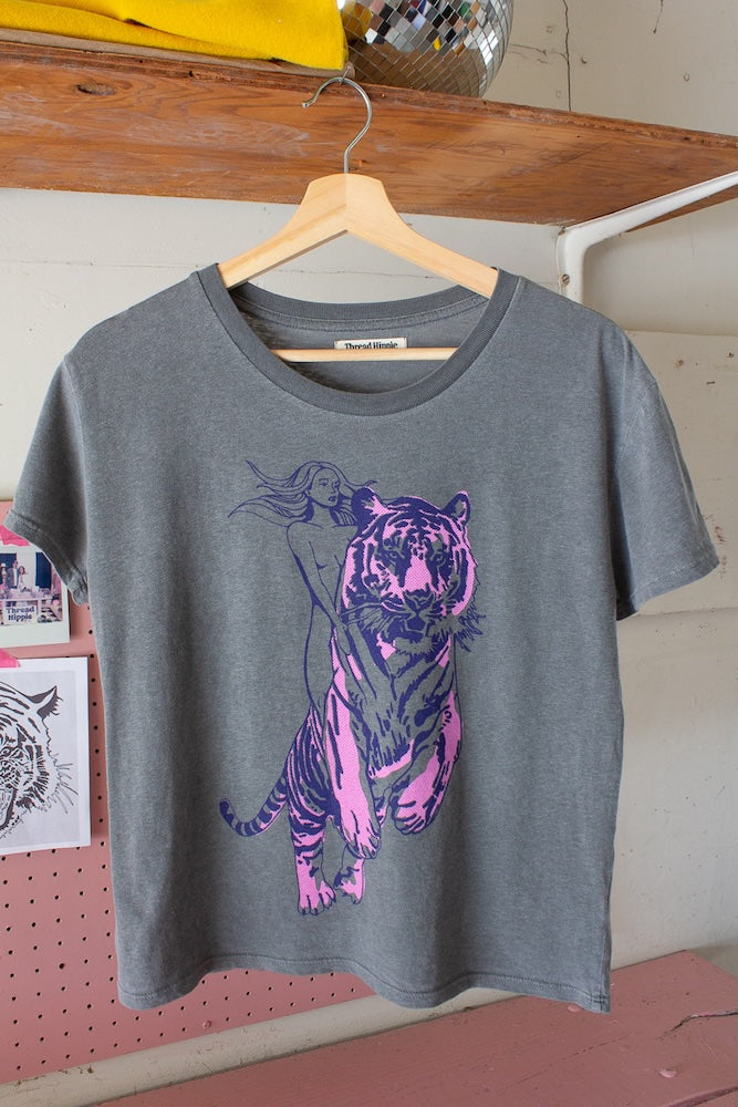 the "untamed" graphic tee on vintage black